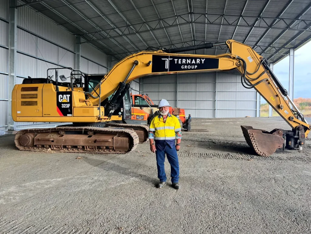 A man and a heavy machinery